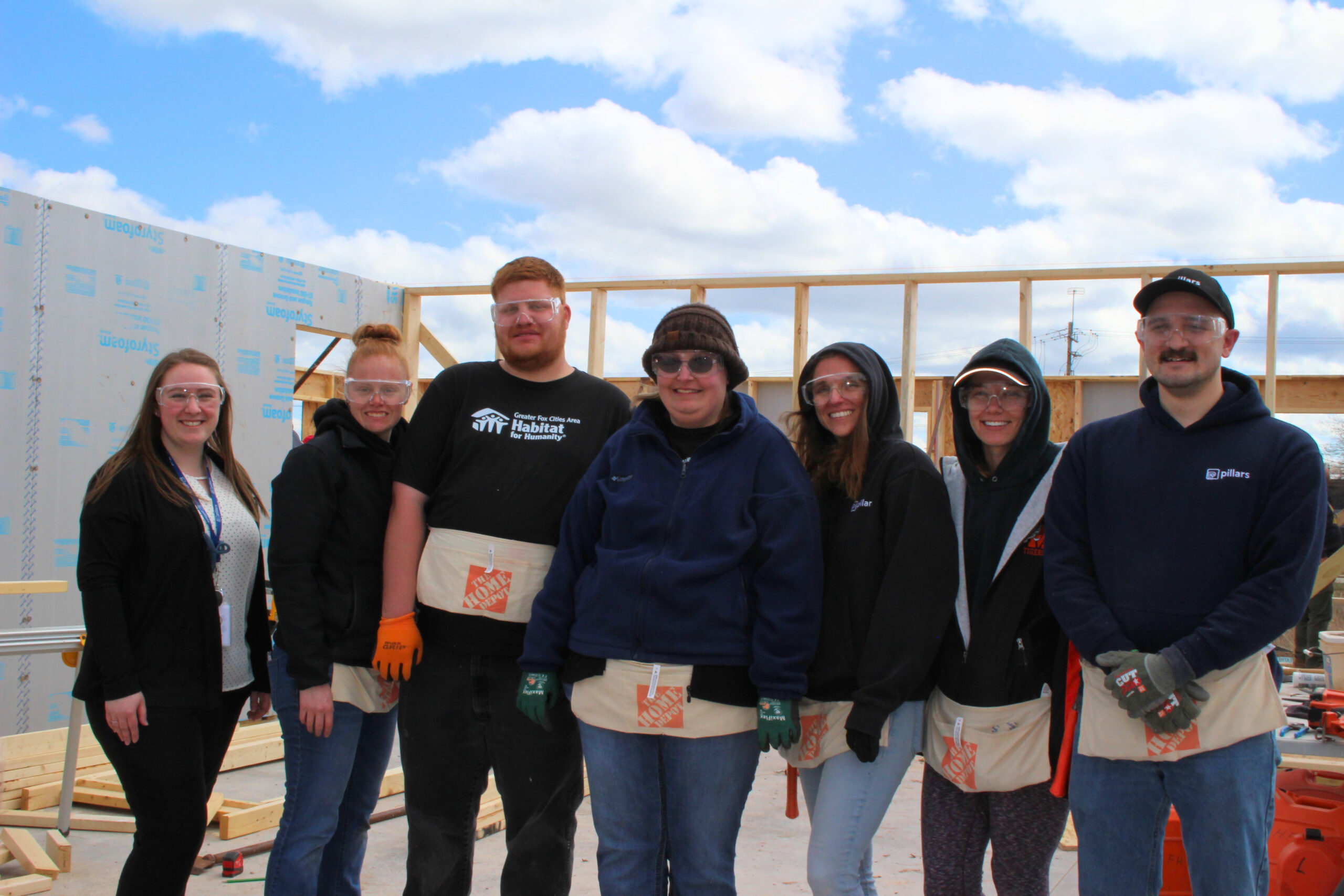 Staff Members Assist with Habitat for Humanity NewBuild for LongTime